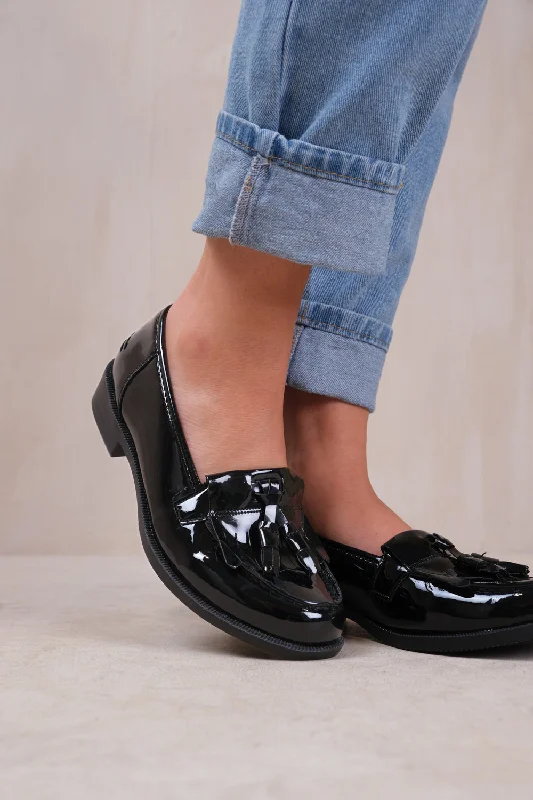Men's loafers with a flexible sole for easy movementIMOGEN FLATFORM SLIP ON LOAFERS SHOES WITH TASSLE IN BLACK PATENT FAUX LEATHER Men's loafers with a flexible sole for easy movementIMOGEN FLATFORM SLIP ON LOAFERS SHOES WITH TASSLE IN BLACK PATENT FAUX LEATHER