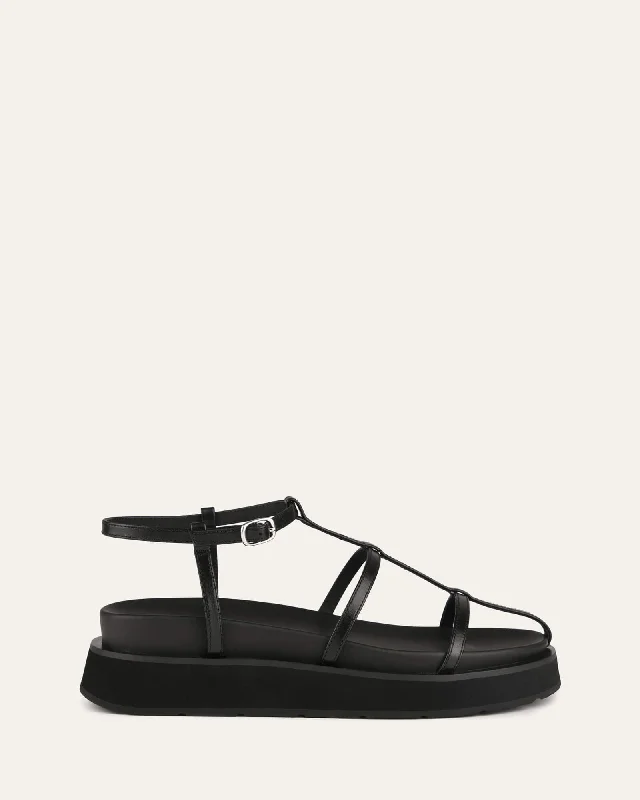 Women's Flat Slide Sandals with a Memory Foam Insole in White for All - Day Comfort Women's Flat Slide Sandals with a Memory Foam Insole in White for All - Day Comfort Lightweight Women's Mesh - Paneled Sandals in Yellow for BreathabilityMINA FLAT SANDALS BLACK LEATHER