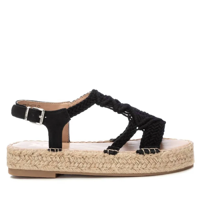 Women's Sandals with a Floral - Printed Upper in Pink for a Feminine Spring Look Women's Sandals with a Floral - Printed Upper in Pink for a Feminine Spring Look Women's Cork - Soled Espadrille Sandals with a Rope - Trimmed Upper in Navy for a Summer VibeWomen's Flat Sandals In Black