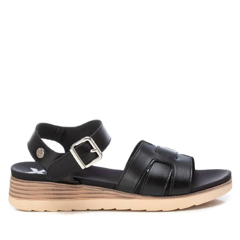 Women's Flat Slide Sandals with a Memory Foam Insole in White for All - Day Comfort Women's Flat Slide Sandals with a Memory Foam Insole in White for All - Day Comfort Waterproof Women's Rubber Beach Sandals with Arch Support in Blue for Water ActivitiesWomen's Wedge Sandals In Black