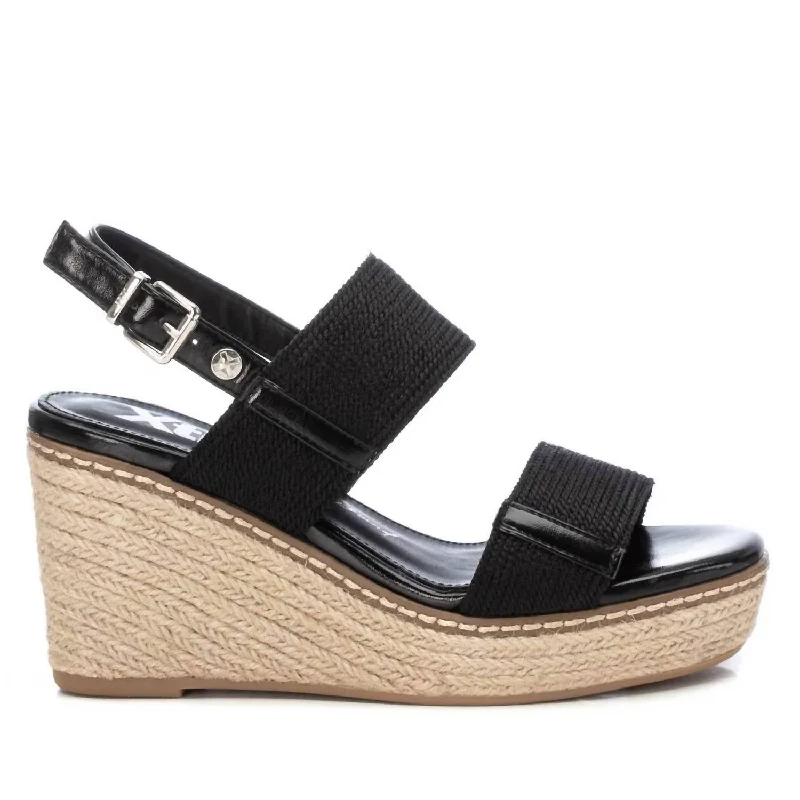 Women's Flat Slide Sandals with a Memory Foam Insole in White for All - Day Comfort Women's Flat Slide Sandals with a Memory Foam Insole in White for All - Day Comfort Waterproof Women's Rubber Beach Sandals with Arch Support in Blue for Water ActivitiesWomen's Wedge Sandals In Black