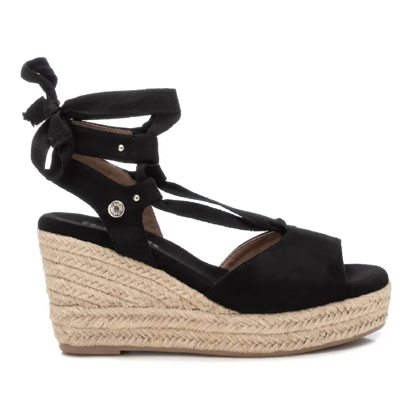Women's Sandals with a Wedge Heel and a Tassel Detail in Orange for a Trendy Look Women's Sandals with a Wedge Heel and a Tassel Detail in Orange for a Trendy Look Adjustable Strap Women's Sandals with a Padded Heel in Pink for a Custom FitWomen's Wedge Sandals In Black