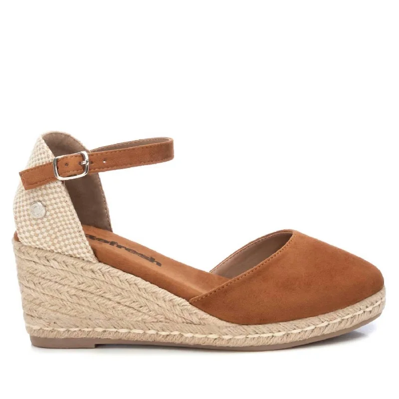 Women's Flat Slide Sandals with a Memory Foam Insole in White for All - Day Comfort Women's Flat Slide Sandals with a Memory Foam Insole in White for All - Day Comfort Lightweight Women's Mesh - Paneled Sandals in Yellow for BreathabilityWomen's Wedge Sandals In Camel