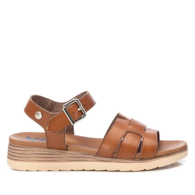 Women's Cork - Soled Espadrille Sandals with a Rope - Trimmed Upper in Navy for a Summer Vibe Women's Cork - Soled Espadrille Sandals with a Rope - Trimmed Upper in Navy for a Summer Vibe Women's Sandals with a Wedge Heel and a Tassel Detail in Orange for a Trendy LookWomen's Wedge Sandals In Taupe