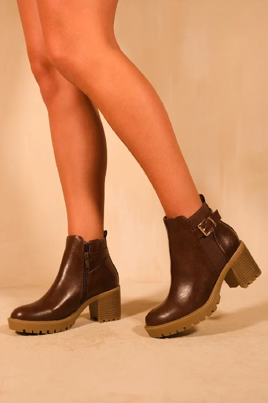 women's ankle boots with glitterKALI MID BLOCK HEEL WITH BUCKLE DETAIL STRETCH ANKLE BOOTS IN BROWN FAUX LEATHER